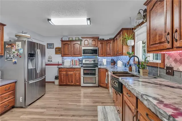 $599,900 | 5131 Northeast State Highway East, Weatherby, MO 64497