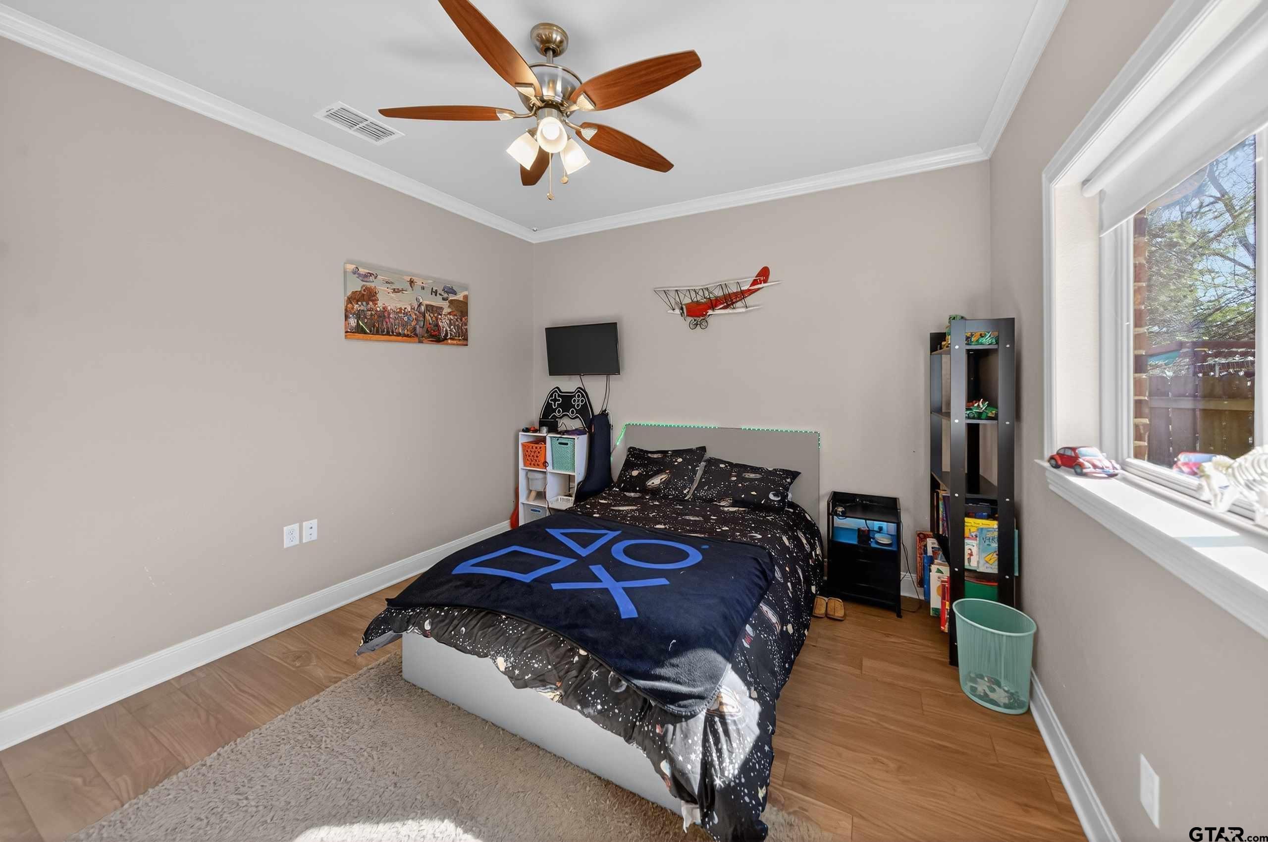 2202 Rana Park Flint, TX 75762 - Photo 11 of 47 a bedroom with a bed and a large window