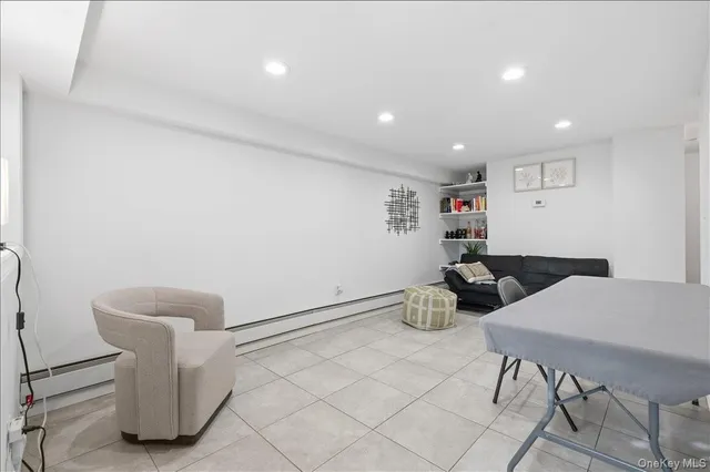 a kitchen with granite countertop a stove sink and cabinets