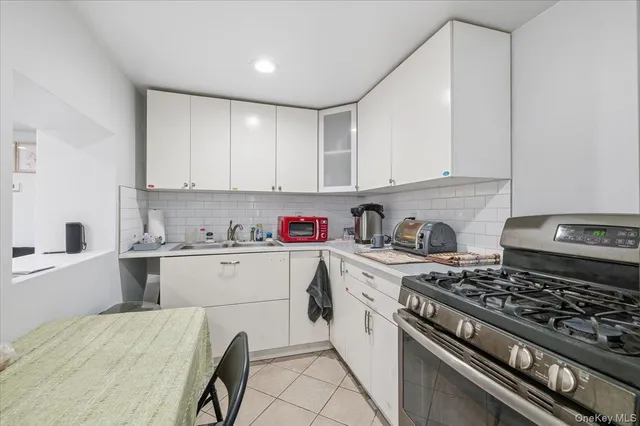 a room with a bed and a window