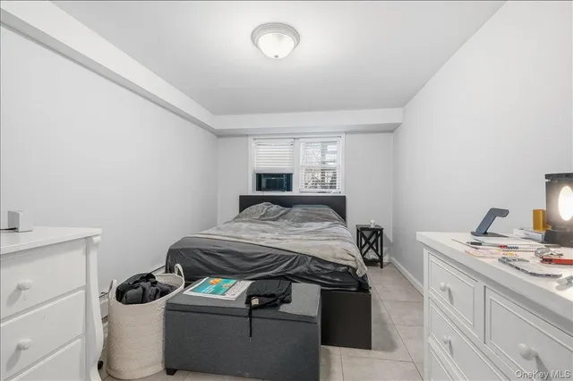 a bedroom with a bed and closet