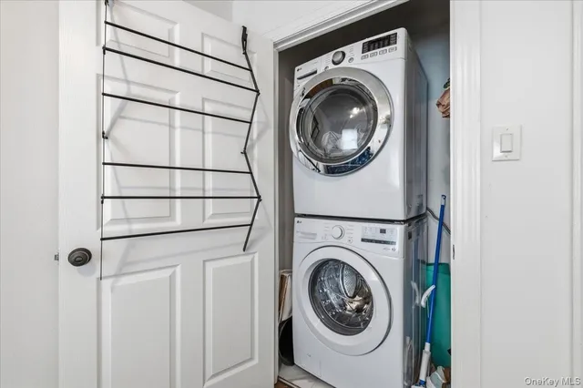 a front view of house with yard and outdoor seating