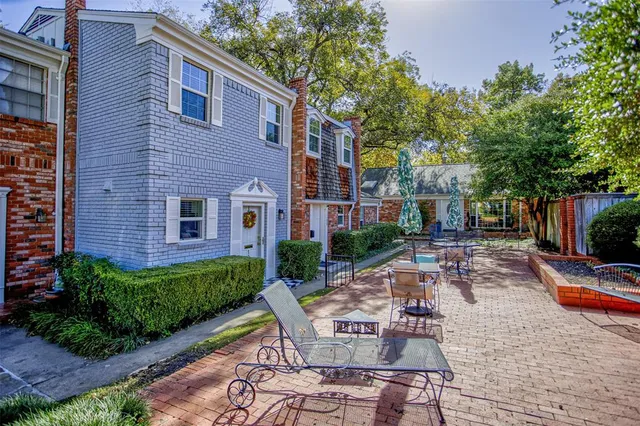 a front view of a house with patio