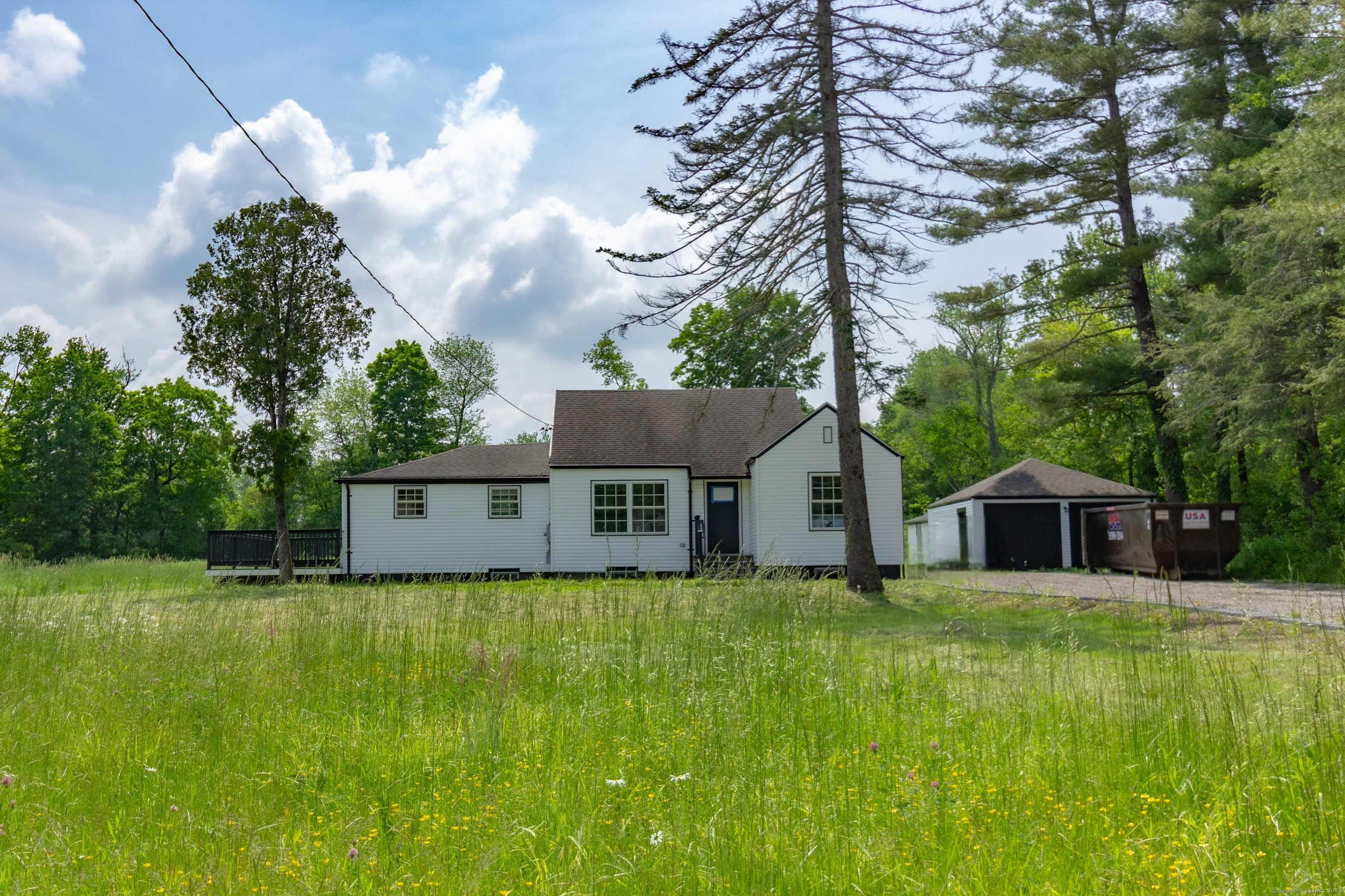 618 Beach Street Goshen, CT 06756 - Photo 17 of 25 a house view with a garden space