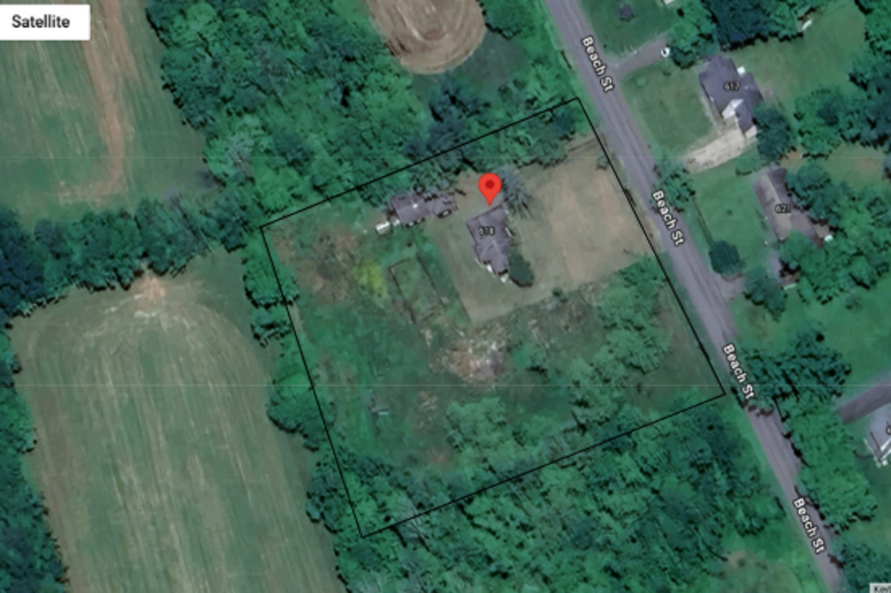 618 Beach Street Goshen, CT 06756 - Photo 25 of 25 an aerial view of a house with a yard