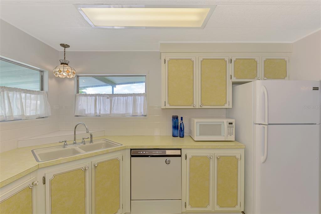 322 Robalo North Port, FL 34287 - Photo 14 of 57 a bathroom with a sink and a mirror