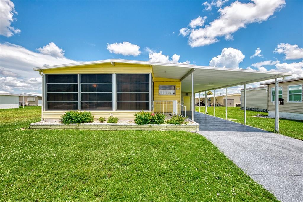 322 Robalo North Port, FL 34287 - Photo 3 of 57 a view of a house with backyard and porch