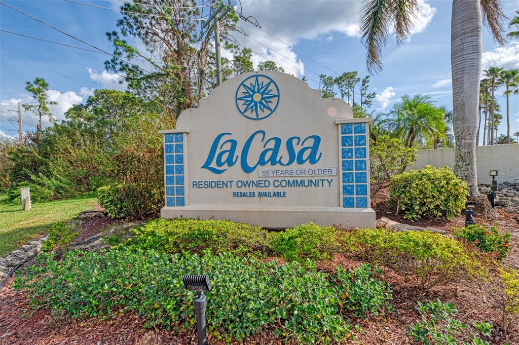 322 Robalo North Port, FL 34287 - Photo 33 of 57 a sign broad in front of flowers