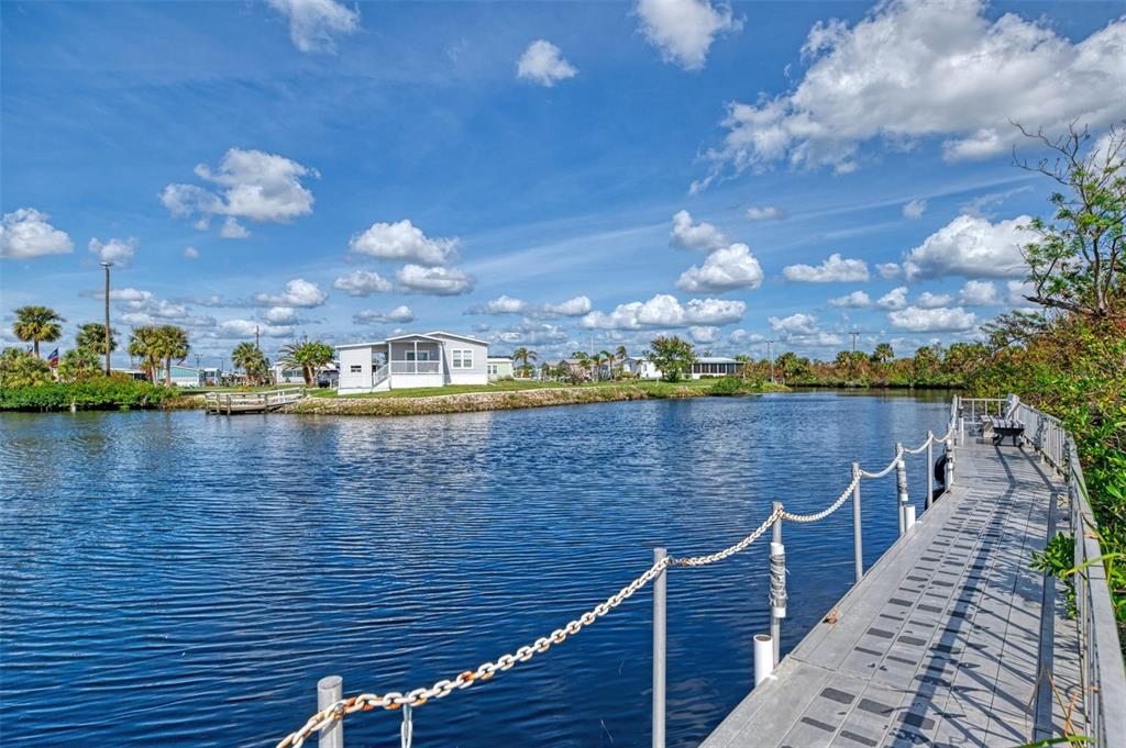 322 Robalo North Port, FL 34287 - Photo 34 of 57 a view of a lake from a balcony