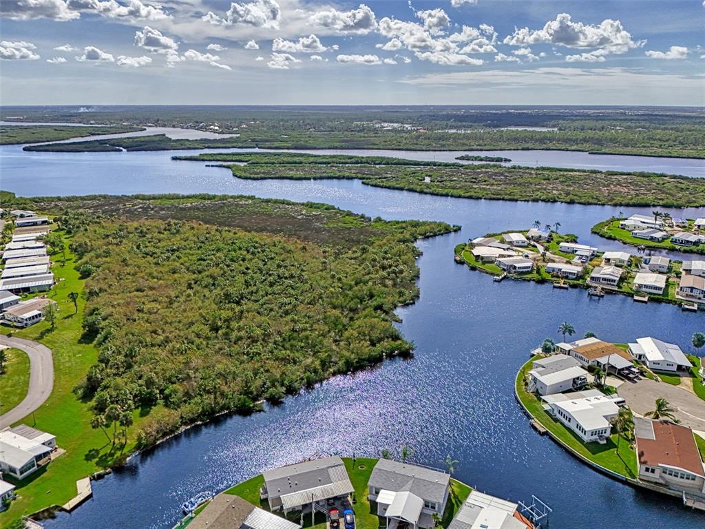 322 Robalo North Port, FL 34287 - Photo 38 of 57 a view of a swimming pool with an outdoor seating