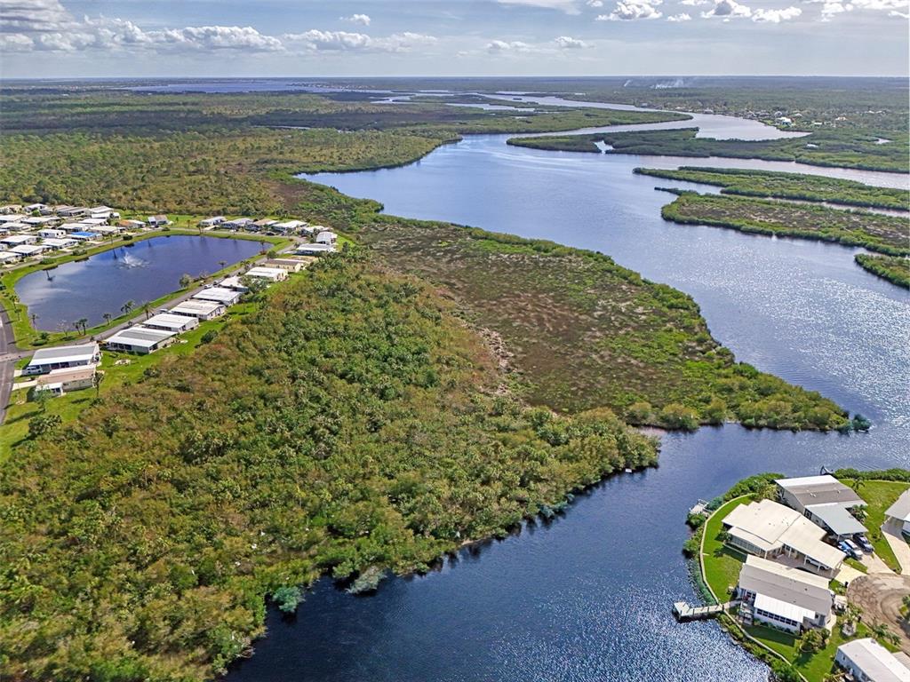 322 Robalo North Port, FL 34287 - Photo 39 of 57 a view of a yard with an outdoor space