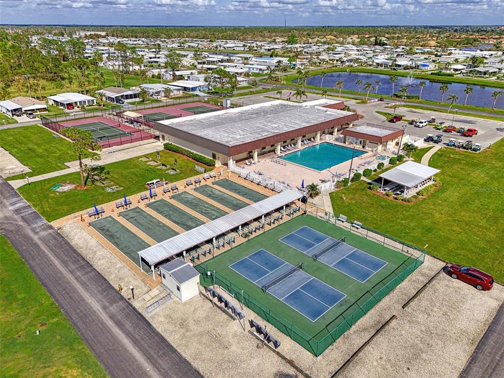 322 Robalo North Port, FL 34287 - Photo 42 of 57 swimming pool with a bench in the middle