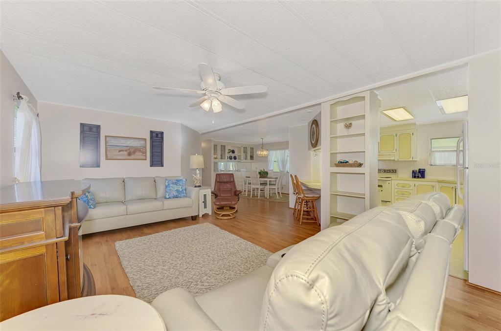 322 Robalo North Port, FL 34287 - Photo 8 of 57 a living room with furniture and wooden floor