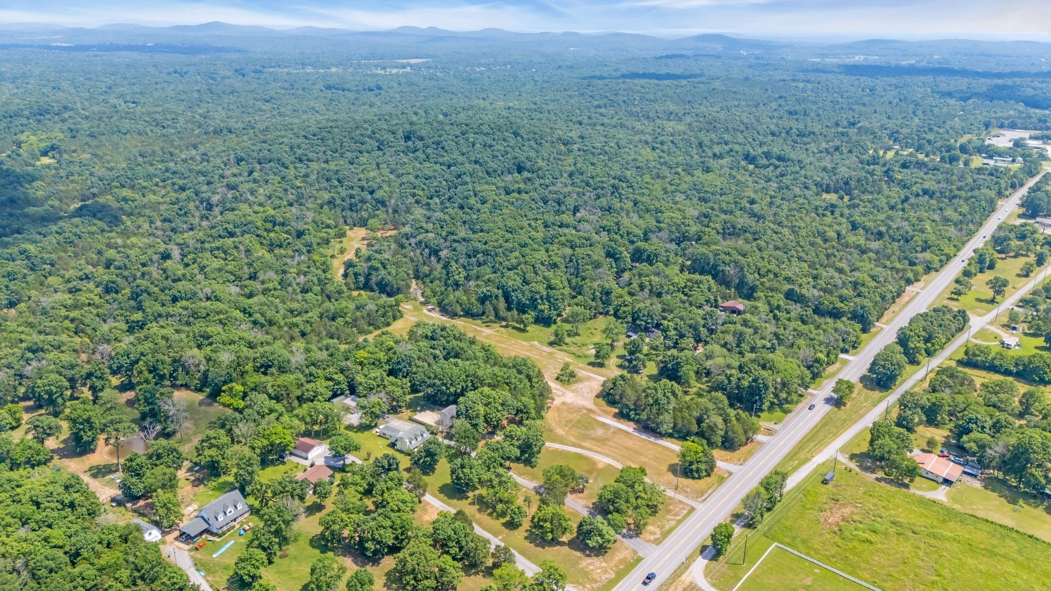 1 Murfreesboro Road Lebanon, TN 37090 - Photo 8 of 32 a view of a green field with lots of bushes