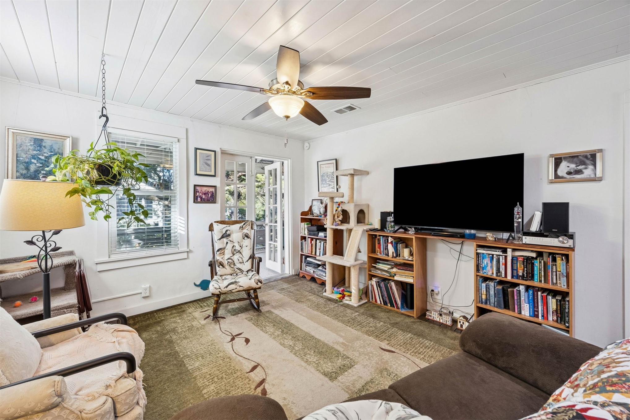 1012 Ladies Street Fernandina Beach, FL 32034 - Photo 18 of 64 a living room with furniture and a flat screen tv
