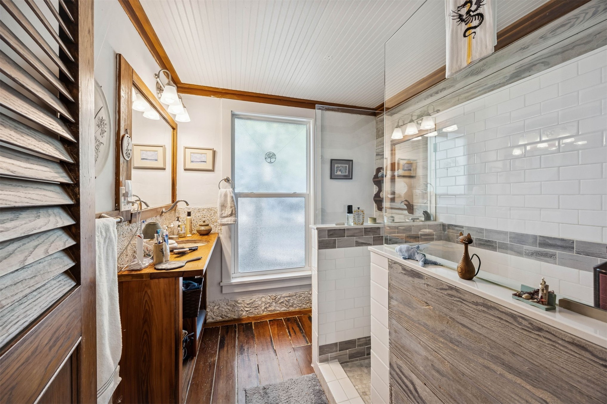 1012 Ladies Street Fernandina Beach, FL 32034 - Photo 30 of 64 a very nice looking living room with a large window and wooden floor