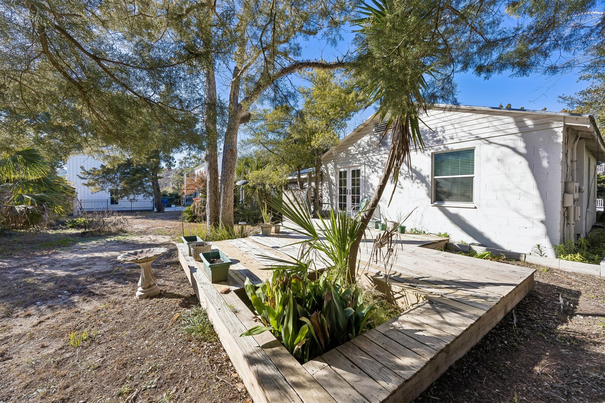 1012 Ladies Street Fernandina Beach, FL 32034 - Photo 34 of 64 a view of a house with backyard and trees