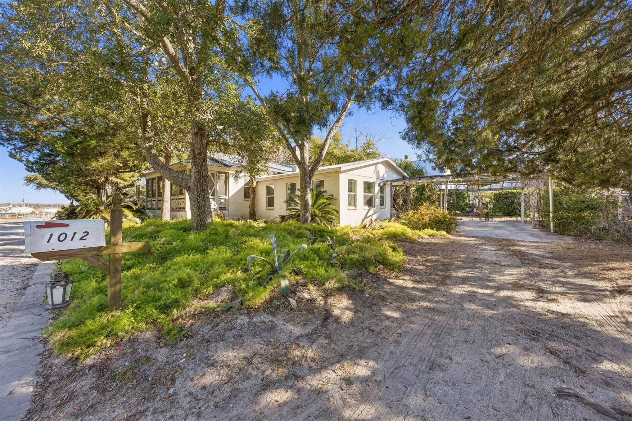 1012 Ladies Street Fernandina Beach, FL 32034 - Photo 5 of 64 a front view of a house with garden