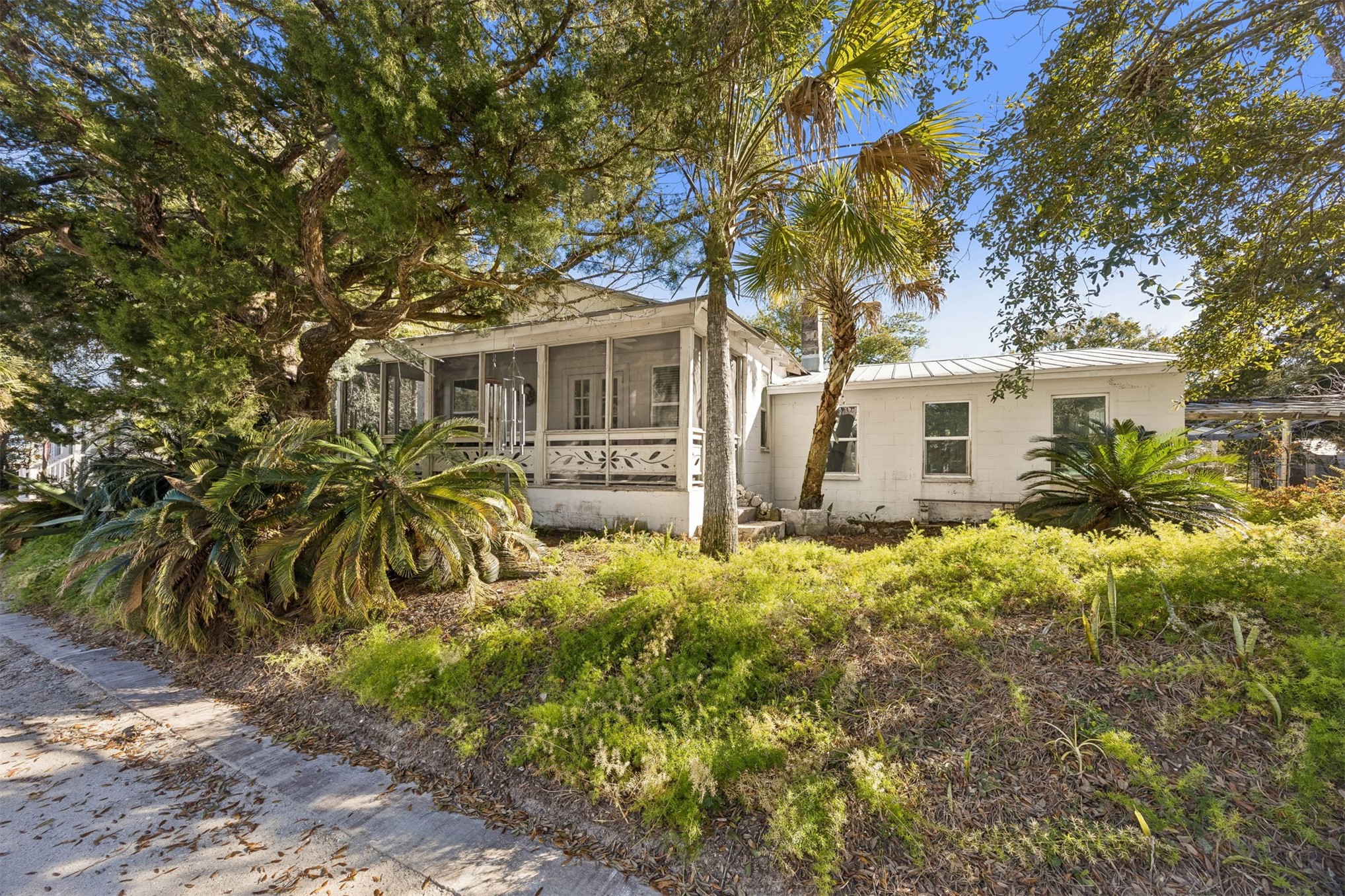 1012 Ladies Street Fernandina Beach, FL 32034 - Photo 6 of 64 a front view of a house with a yard