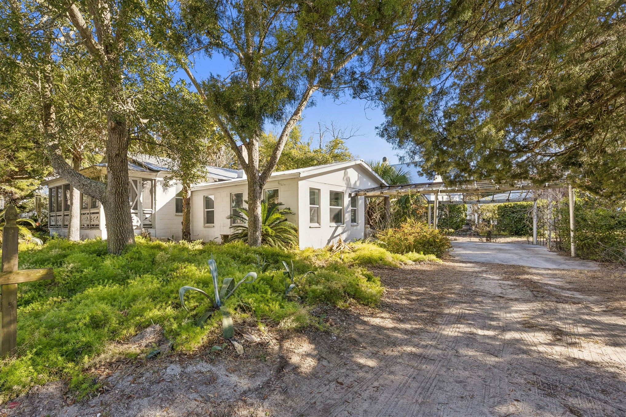 1012 Ladies Street Fernandina Beach, FL 32034 - Photo 7 of 64 a front view of a house with garden