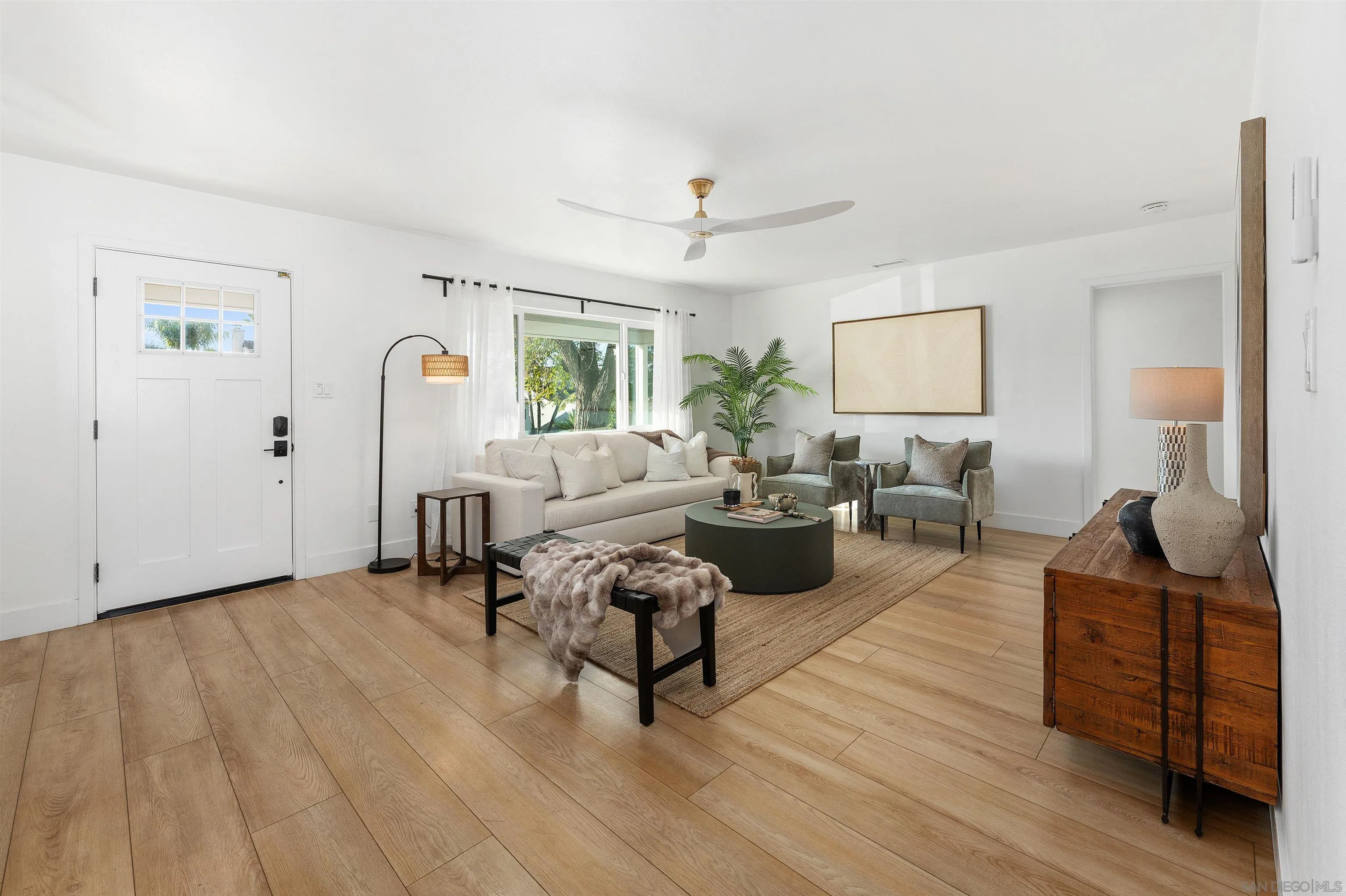 2103 Garfield Road San Diego, CA 92110 - Photo 11 of 34 a living room with furniture and wooden floor