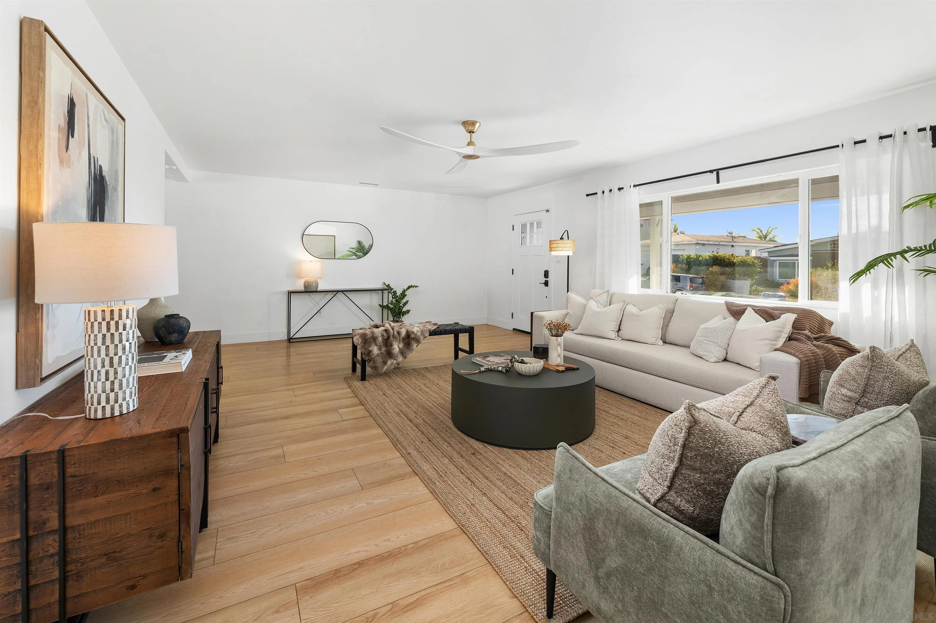 2103 Garfield Road San Diego, CA 92110 - Photo 12 of 34 a living room with furniture and a large window
