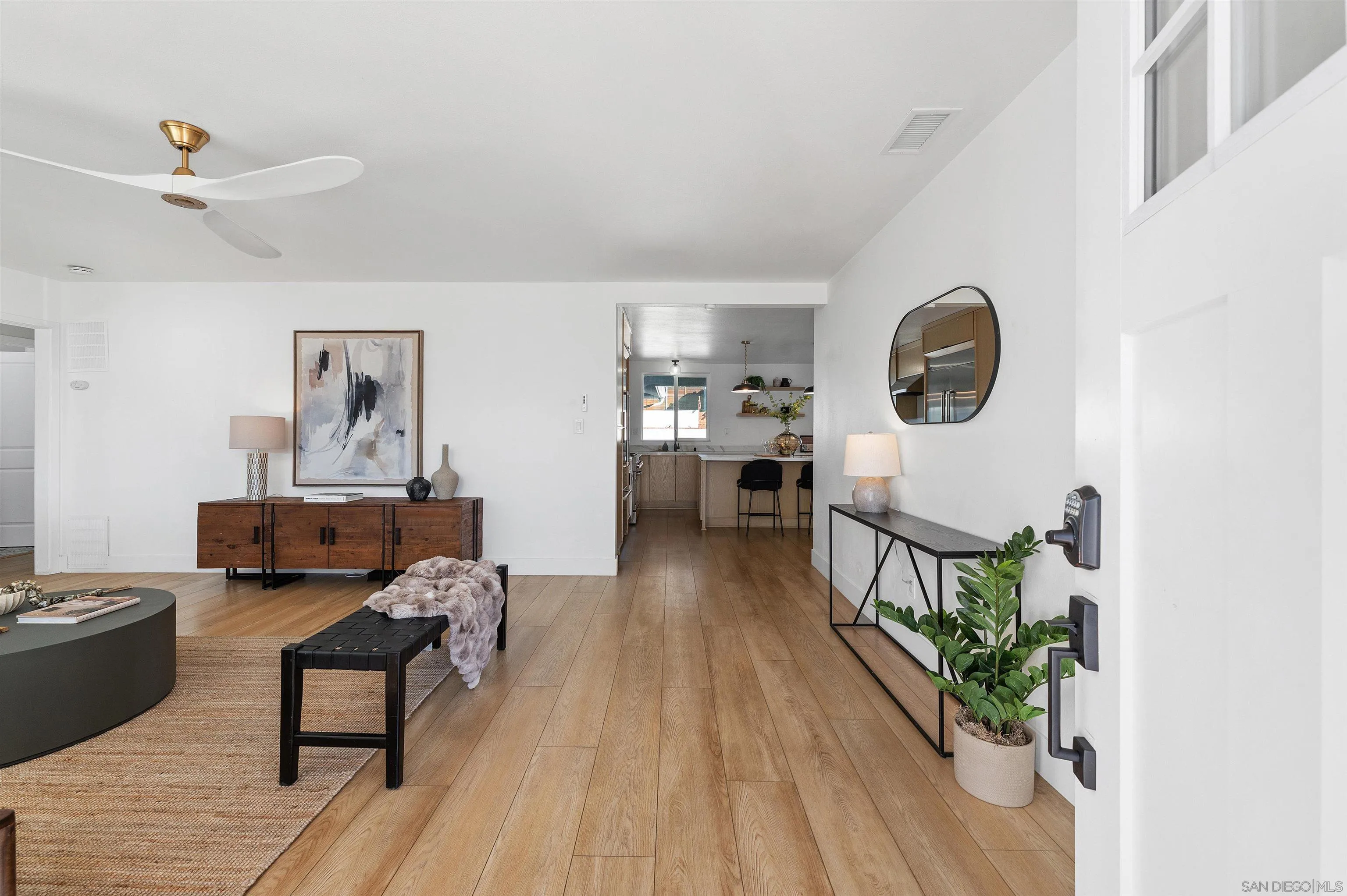 2103 Garfield Road San Diego, CA 92110 - Photo 14 of 34 a living room with furniture and a wooden floor