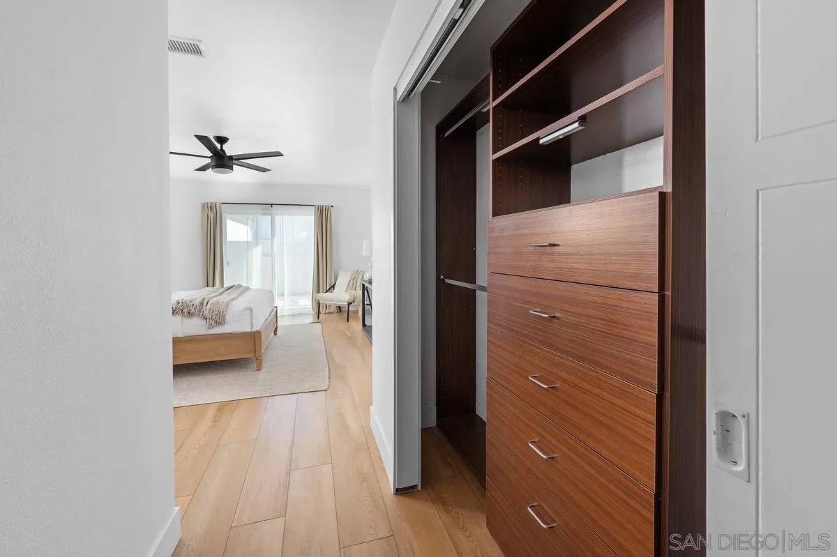 2103 Garfield Road San Diego, CA 92110 - Photo 18 of 34 a hallway with a hardwood floor and a hallway