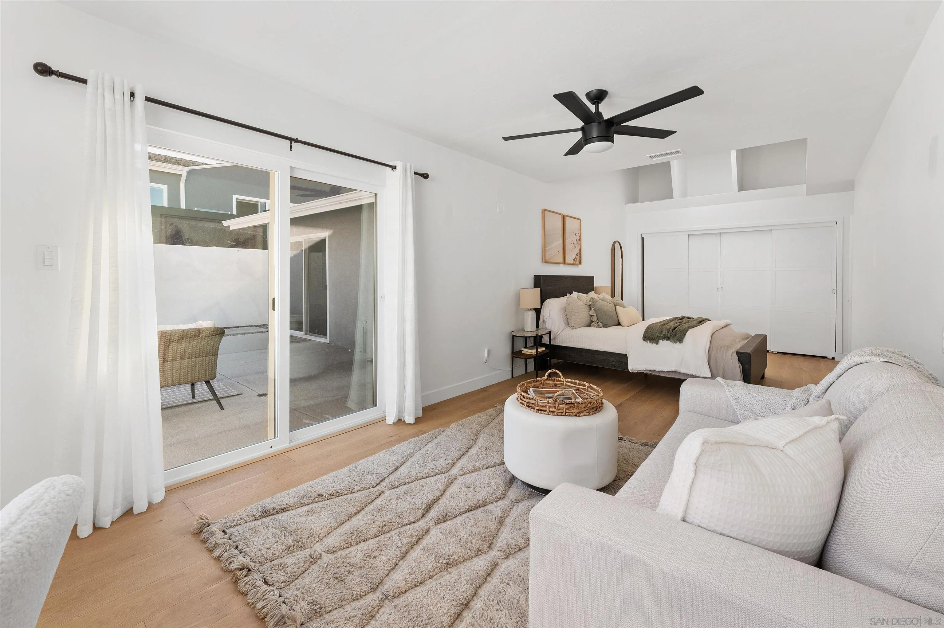 2103 Garfield Road San Diego, CA 92110 - Photo 24 of 34 a living room with furniture and a wooden floor