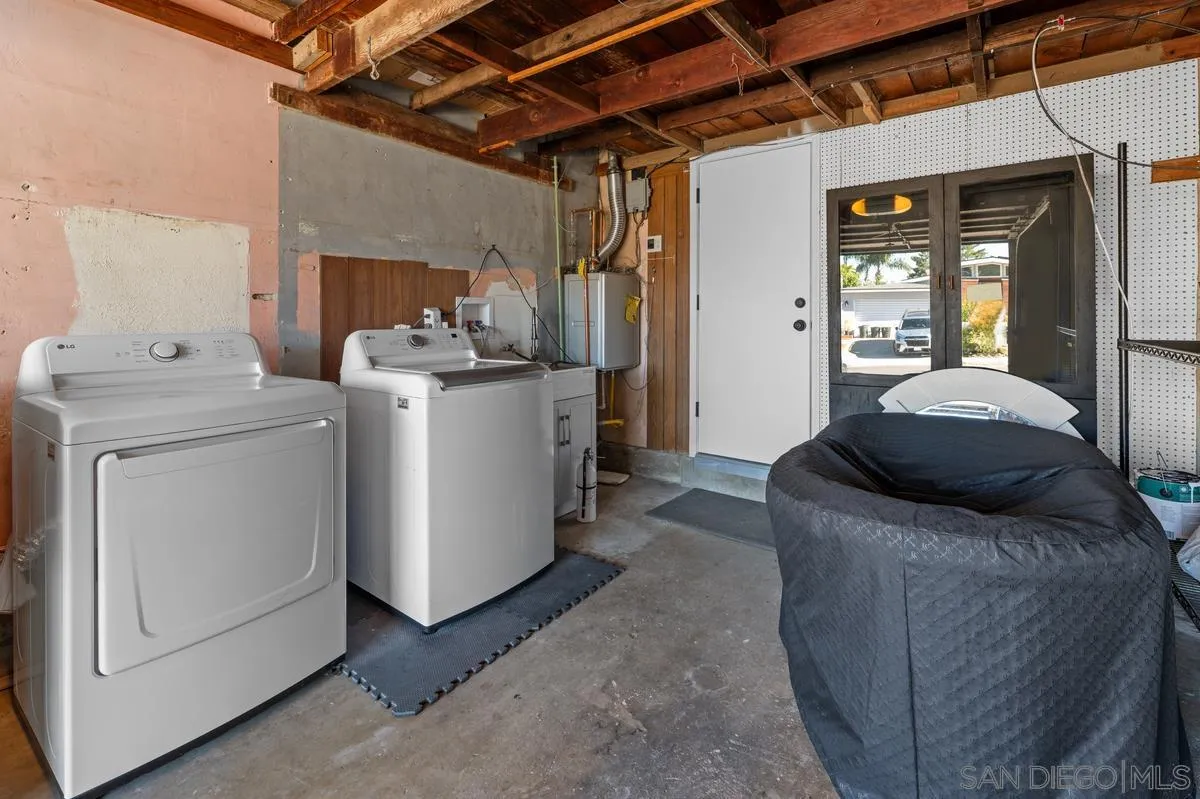 2103 Garfield Road San Diego, CA 92110 - Photo 34 of 34 a living room with furniture and a washer dryer