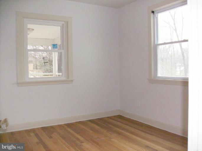 4133 Maple Road Suitland, MD 20746 - Photo 7 of 10 an empty room with a window