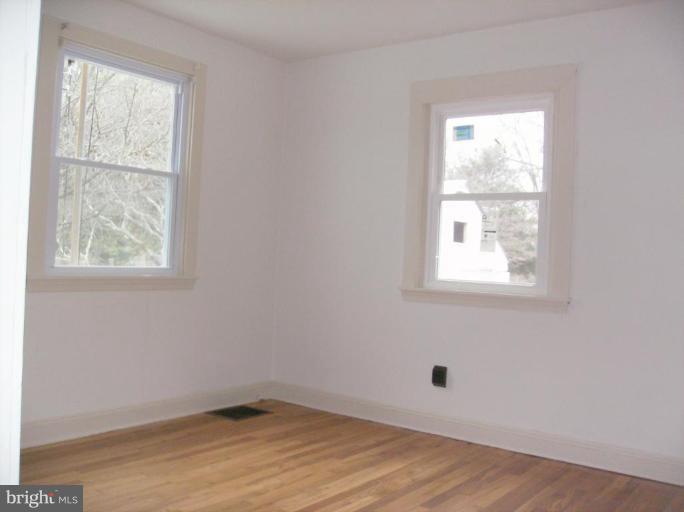4133 Maple Road Suitland, MD 20746 - Photo 9 of 10 an empty room with a window