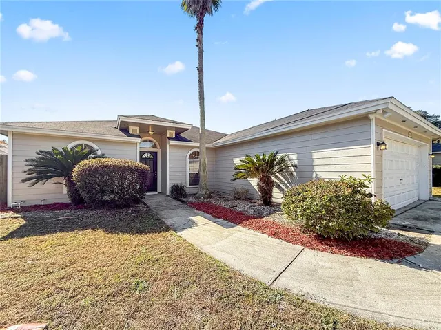 a picture of a room with a white wall and a picture