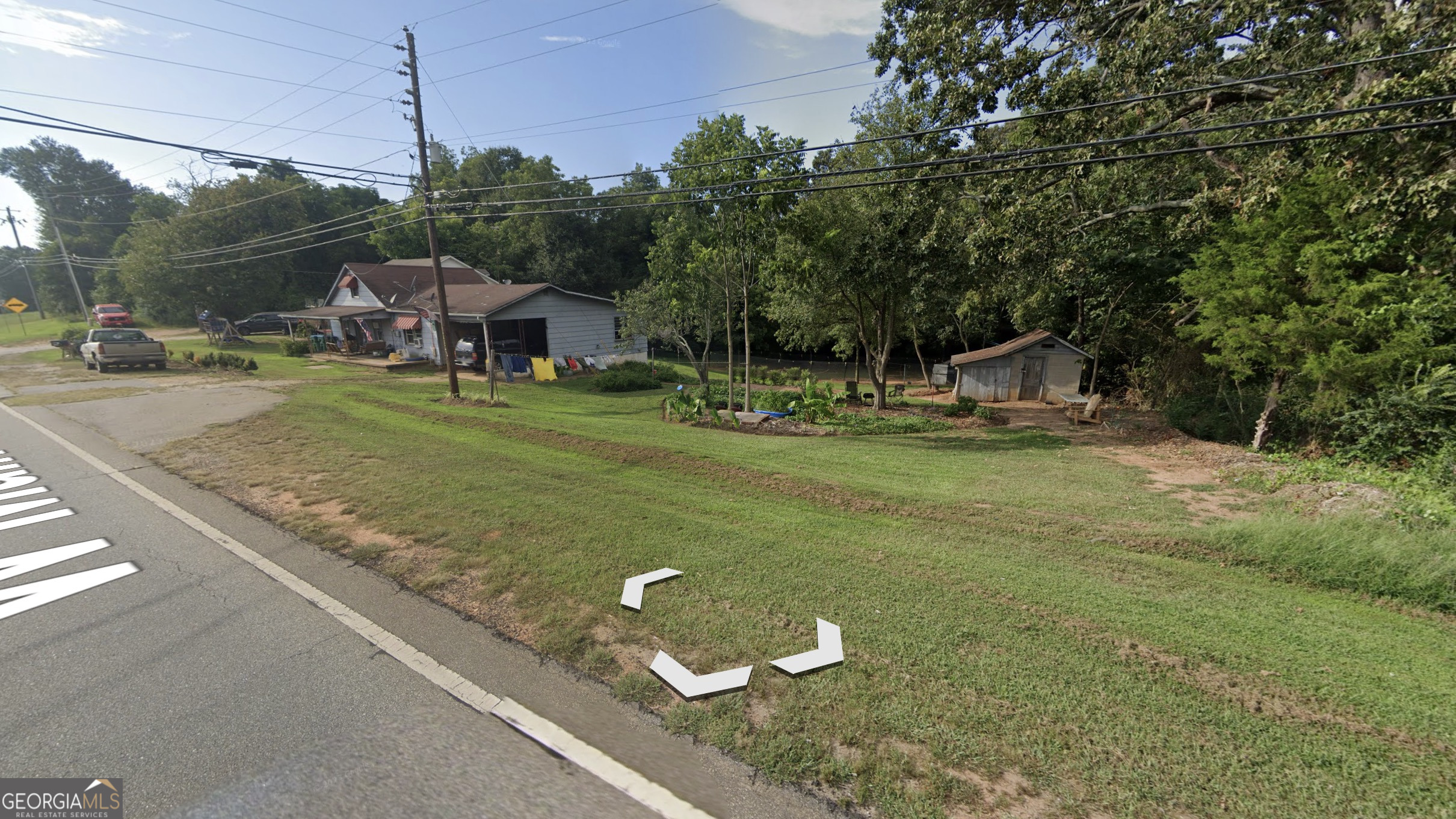 2394 West Main Street Royston, GA 30662 - Photo 3 of 5 a view of a house with backyard