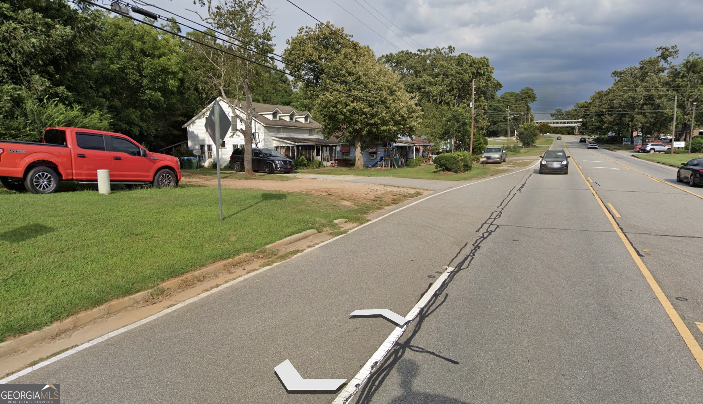 2394 West Main Street Royston, GA 30662 - Photo 5 of 5 a view of a street with houses