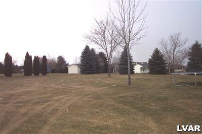 651 Creamery Road Nazareth, PA 18064 - Photo 9 of 24 a view of dirt field with trees in background