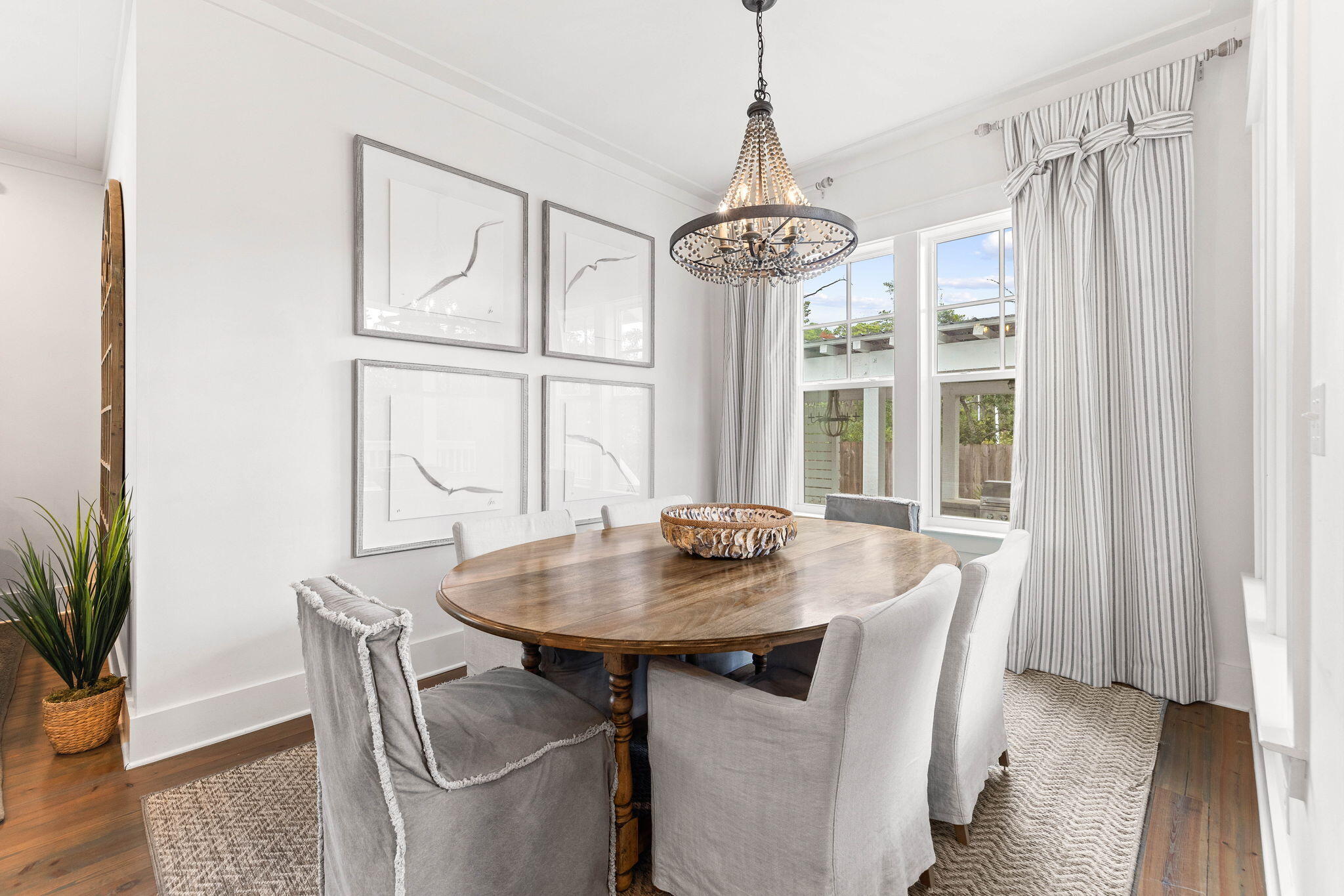 47 Trail Lane Santa Rosa Beach, FL 32459 - Photo 11 of 53 a view of a dining room with furniture window and wooden floor