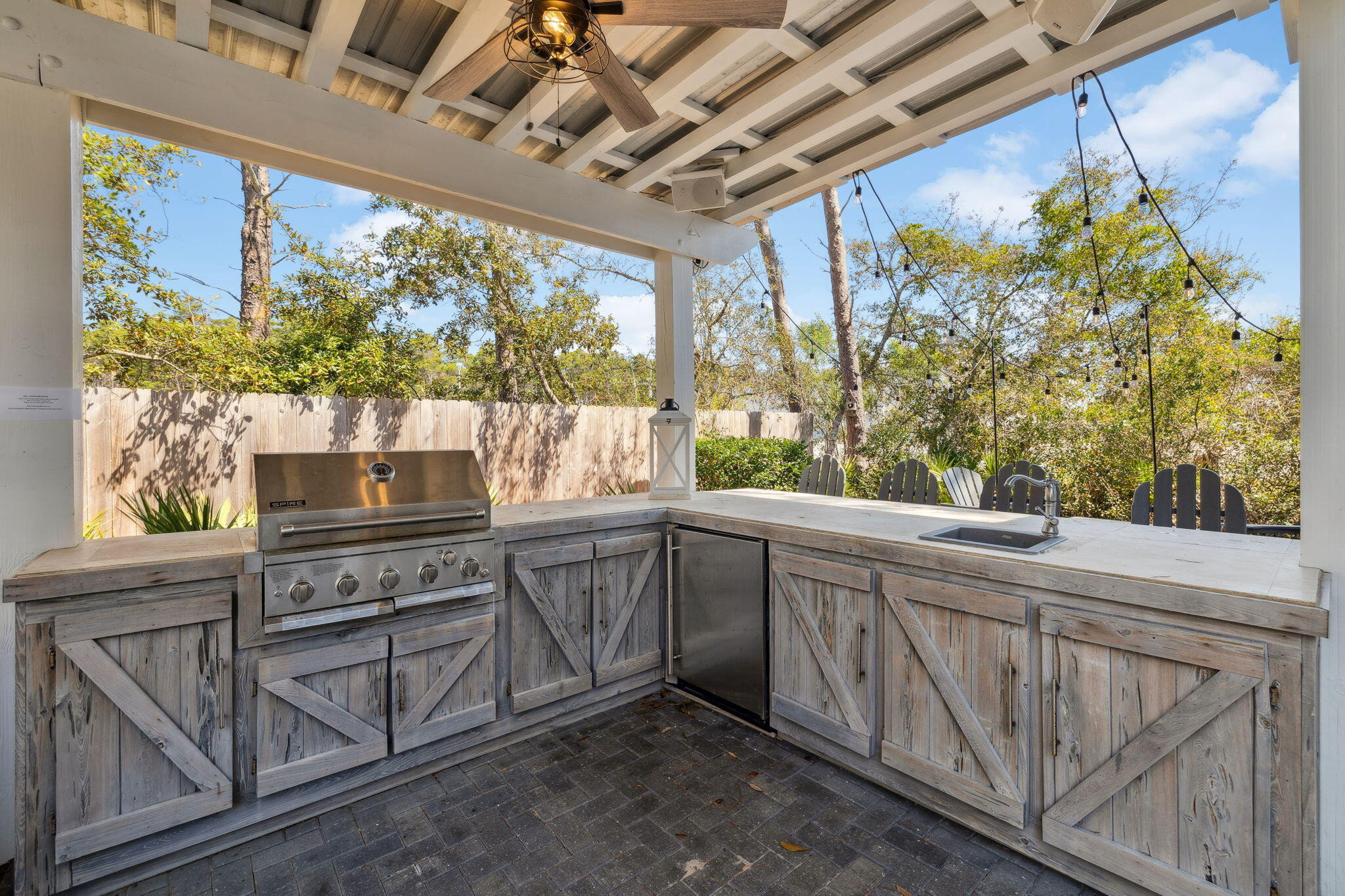 47 Trail Lane Santa Rosa Beach, FL 32459 - Photo 29 of 53 a kitchen with stainless steel appliances granite countertop a stove a sink and dishwasher