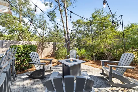 a view of an outdoor space with furniture