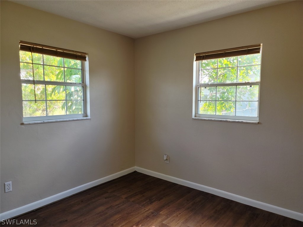 1509 Lindale Circle Lehigh Acres, FL 33936 - Photo 12 of 16 an empty room with a window