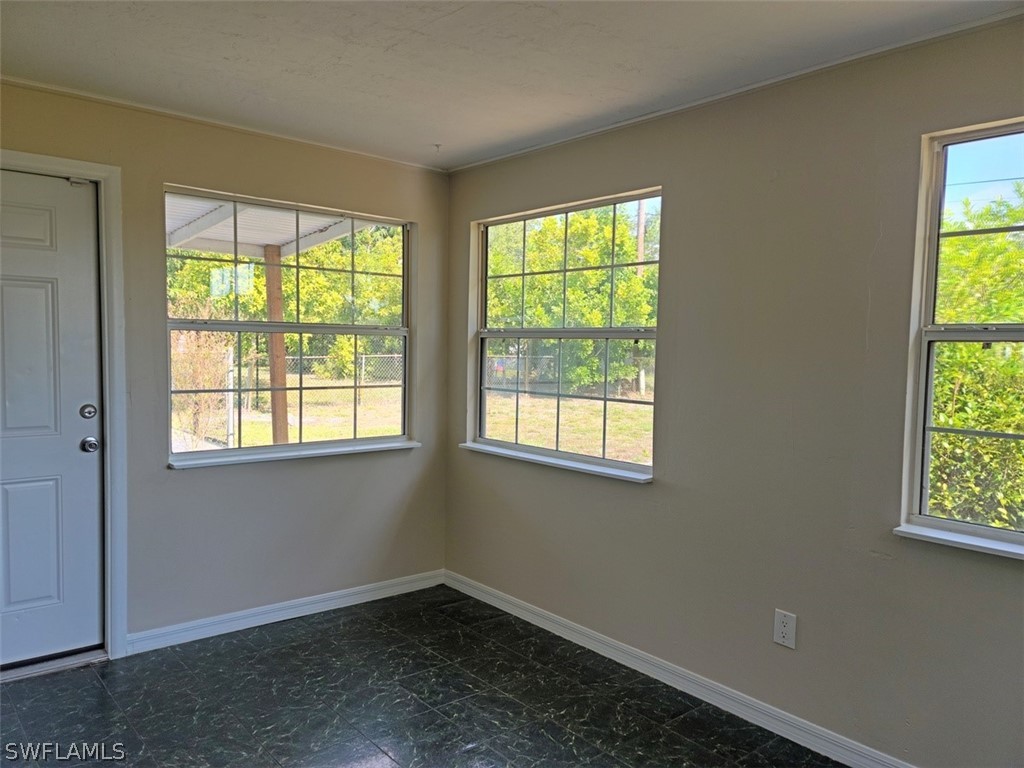 1509 Lindale Circle Lehigh Acres, FL 33936 - Photo 15 of 16 an empty room with a window