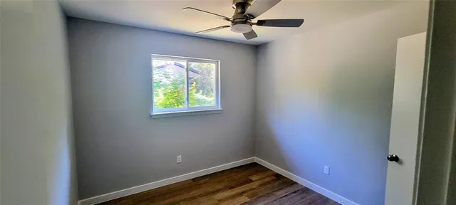 a bathroom with a toilet a sink and bathtub