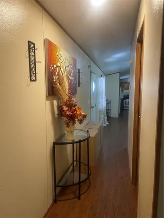 a bedroom with a bed and a chair