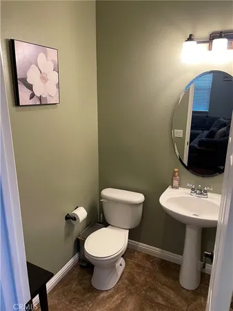 a view of a garage with rack and bicycle