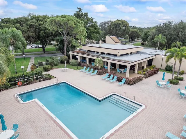 an aerial view of a house with a garden