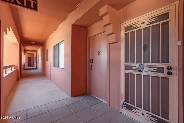 a view of a hallway with many windows