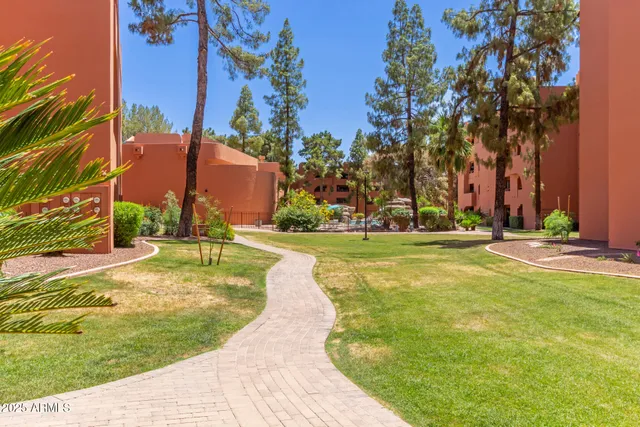a view of a swimming pool with an outdoor space