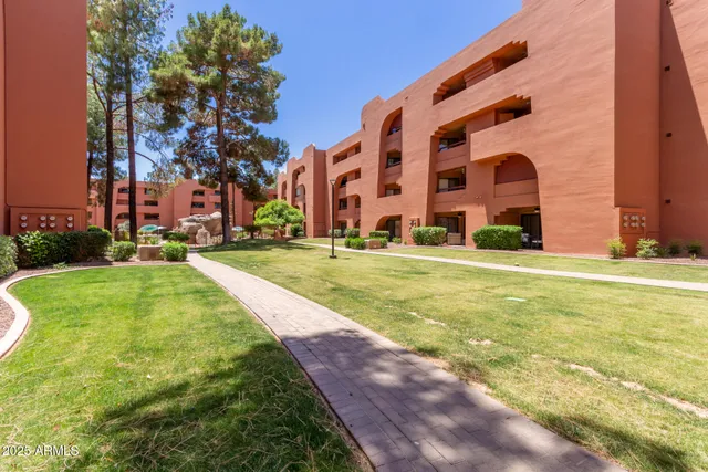 a view of building with yard