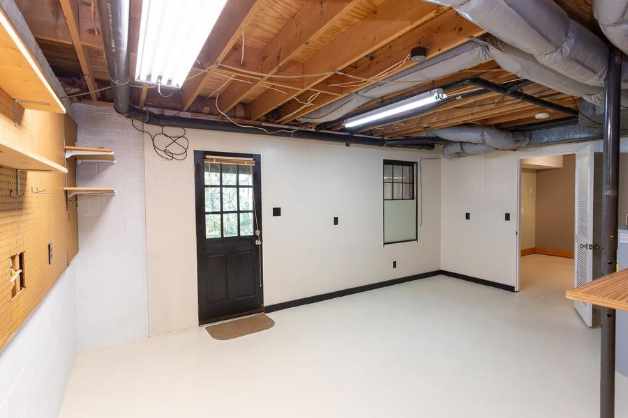 7533 Milestone Court Raleigh, NC 27615 - Photo 30 of 51 Unfinished space for storage