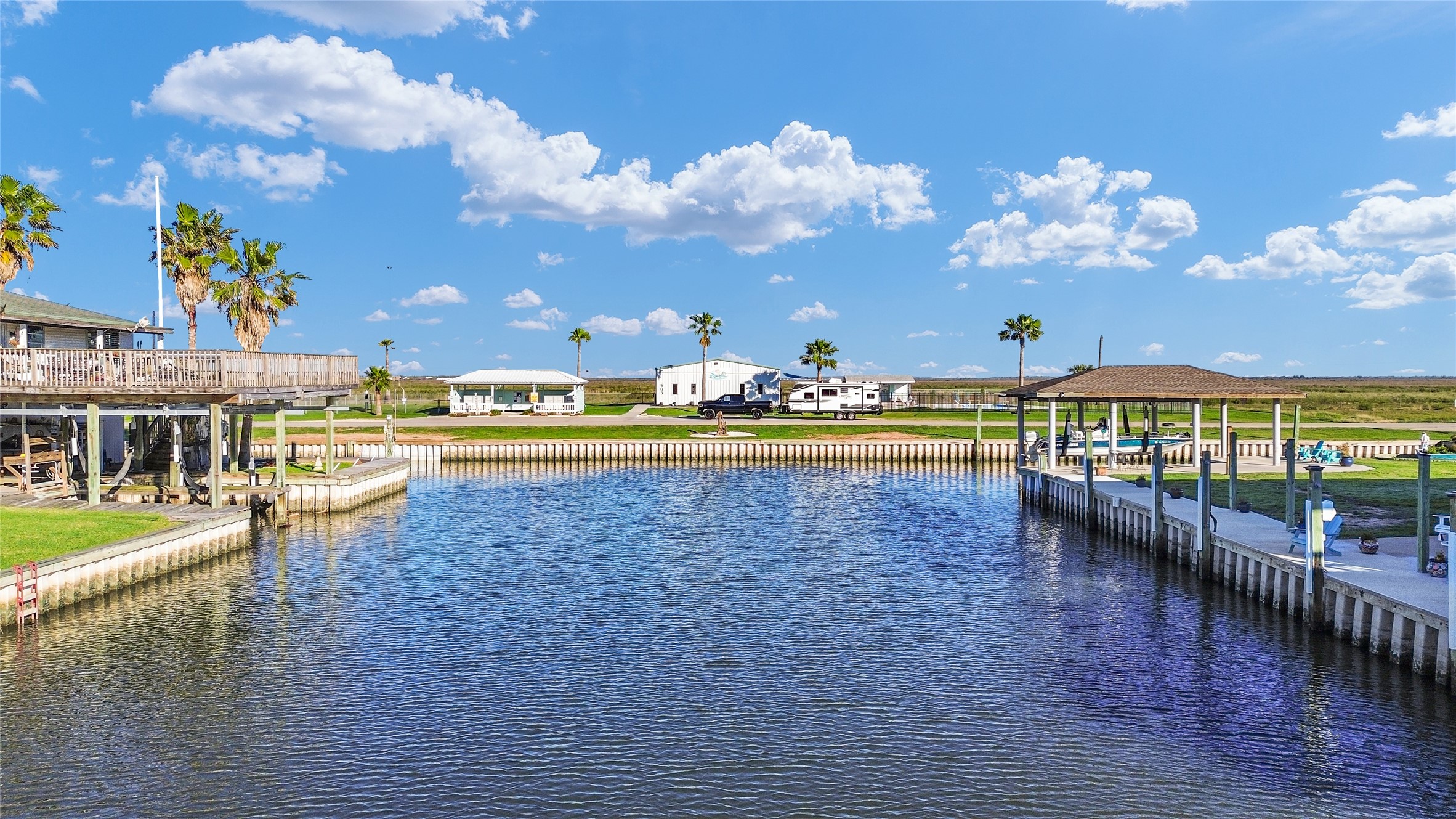 114 Four Master Road Freeport, TX 77541 - Photo 12 of 37 a view of a swimming pool and outdoor seating